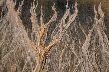 Ocean sand pattern taken at a beach on the southeast coast of Bahia, Brazil