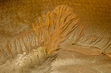 Ocean sand pattern taken at a beach on the southeast coast of Bahia, Brazil